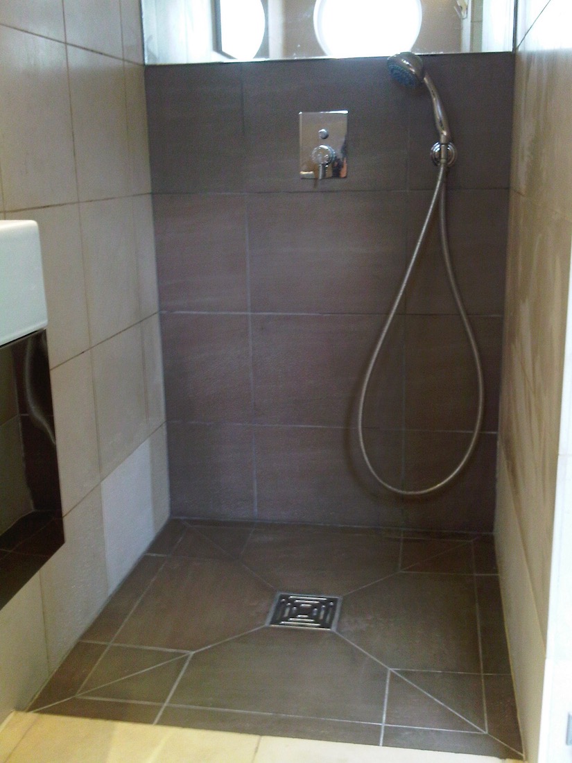 Walk-in shower room with stone work.